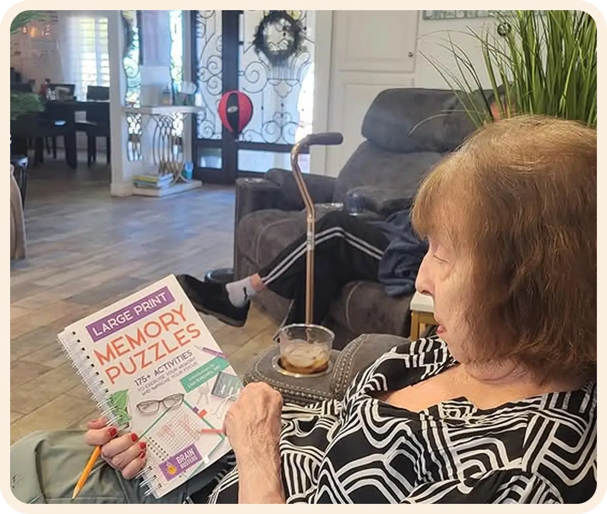 Senior enjoying memory puzzles in living room