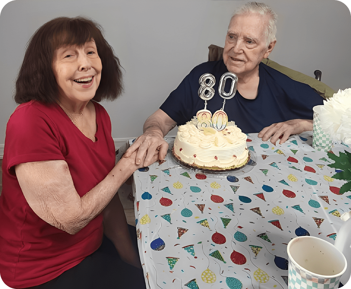 Elderly couple celebrating 80th birthday